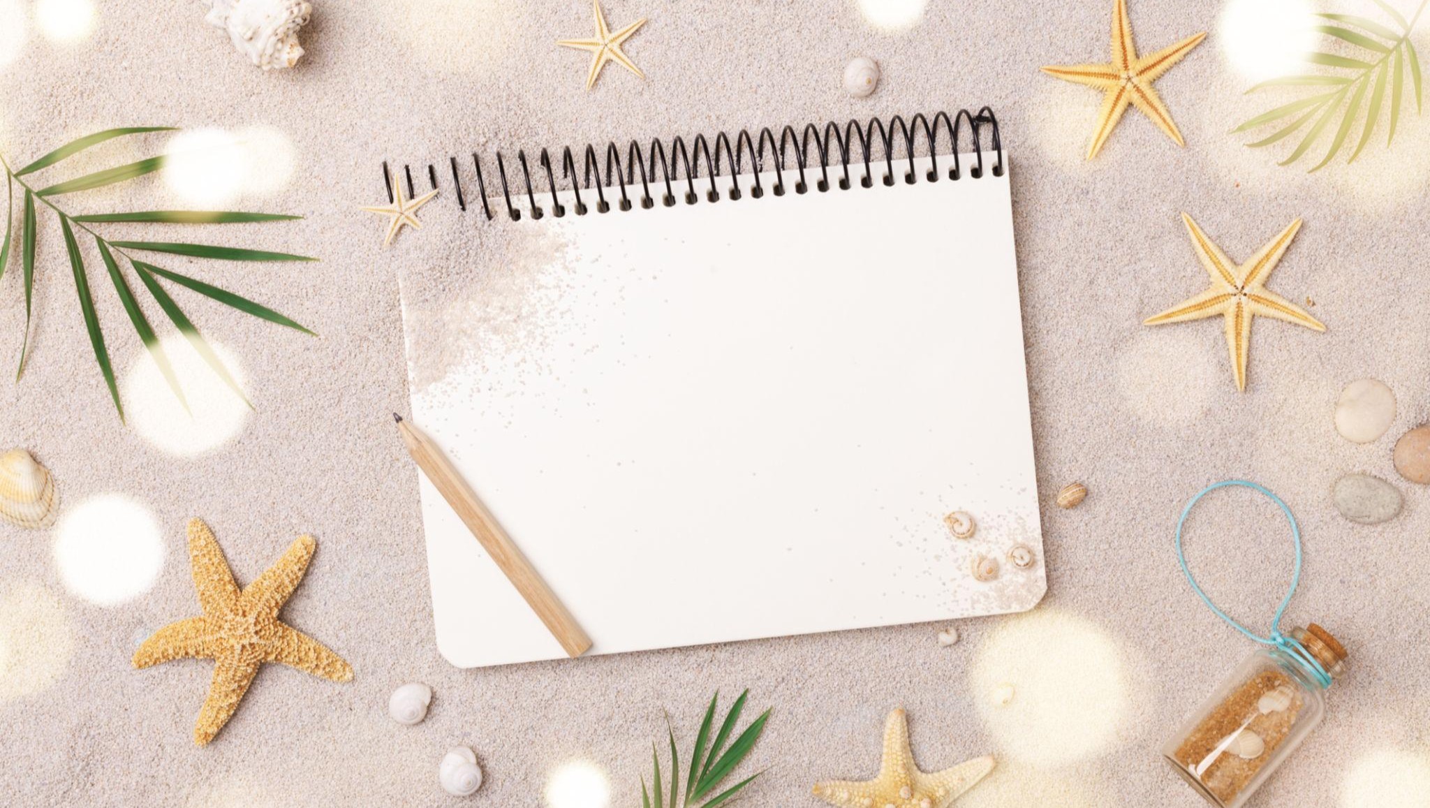 砂浜でメモ帳